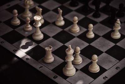 High angle view of chess on table