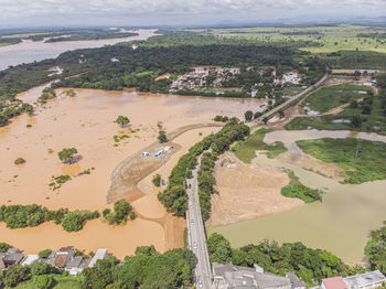 Flooded river with mud after construction of dam