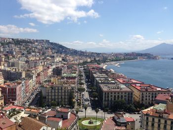 Aerial view of town against sky