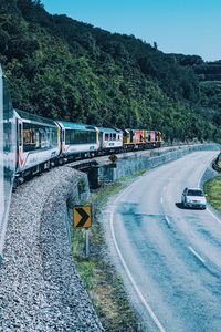 Train on road against sky