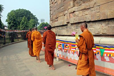 Rear view of people at temple