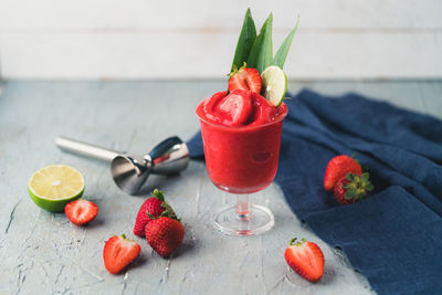 Close-up of red fruit on table