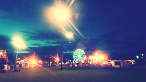 Illuminated street light at night