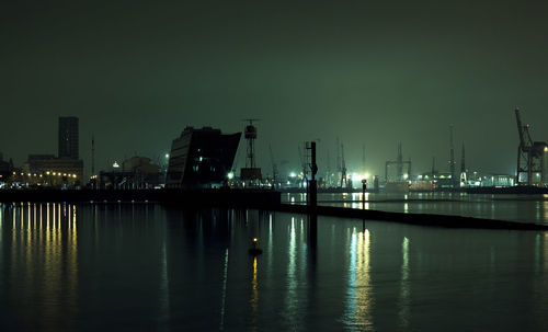 Reflection of illuminated buildings in water