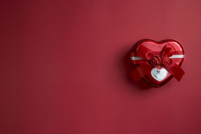 Close-up of heart shape on red box