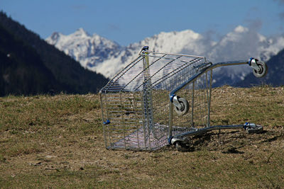 Bicycles on mountain against sky