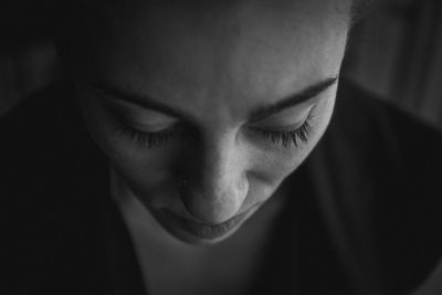 Close-up of sad woman looking down