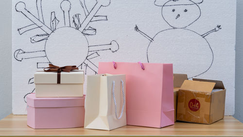 Close-up of christmas gifts on table