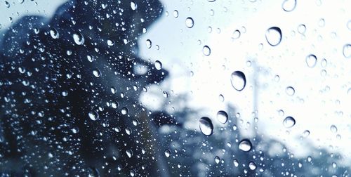 Close-up of water drops on glass