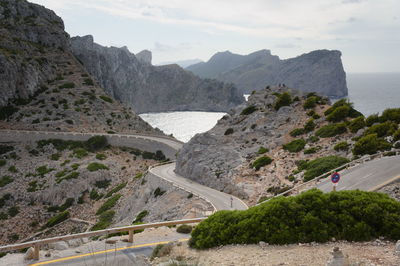 High angle view of road by sea against sky