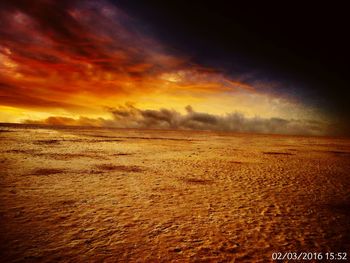 Scenic view of cloudy sky at sunset