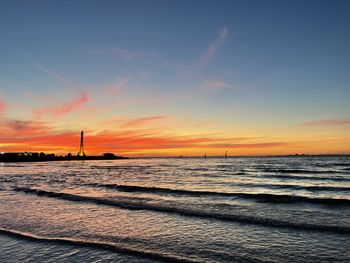 Scenic view of sea against sky during sunset