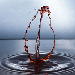 Close-up of rippled water against sky