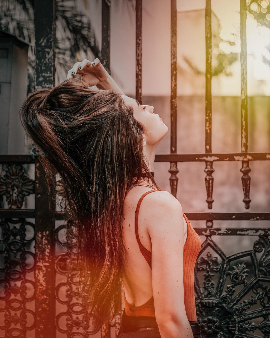 one person, women, adult, hairstyle, rear view, long hair, female, young adult, lifestyles, dress, red, photo shoot, brown hair, nature, fashion, indoors, waist up, architecture, blond hair, back, day, window, leisure activity, portrait, person