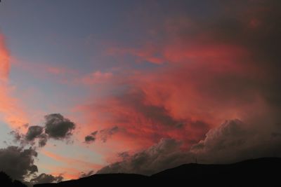 Low angle view of dramatic sky during sunset