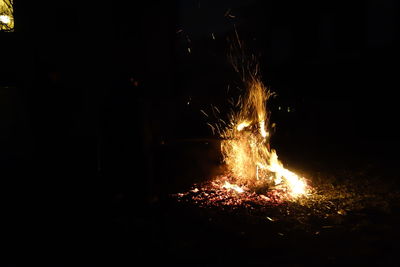 Close-up of firework display at night