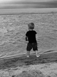 Woman standing on beach