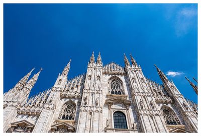Low angle view of milano cathedral against sky