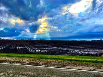 Scenic view of field against sky