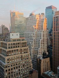 Buildings in new york city with morning lights