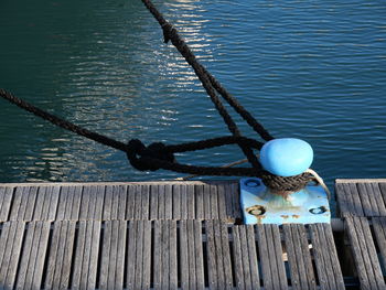 High angle view of rope on pier