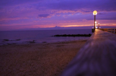 Scenic view of sea against sky at sunset