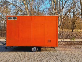 Orange trailer for street food transport