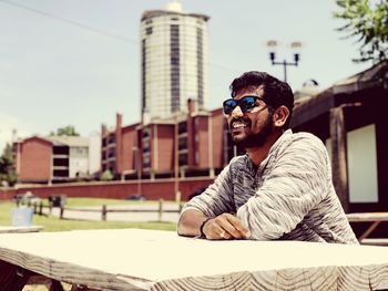 Portrait of young man wearing sunglasses