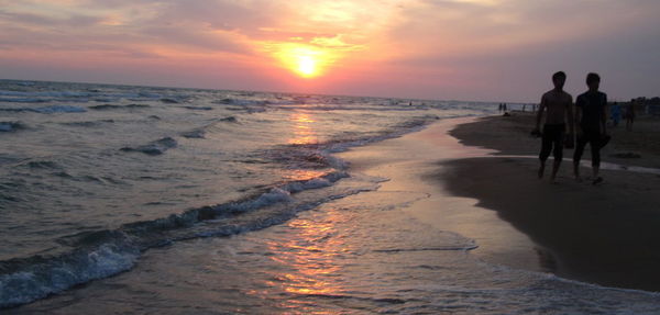 Scenic view of sea at sunset