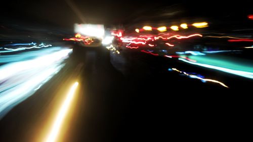Light trails on road at night