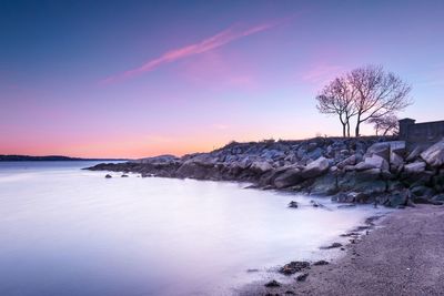 Scenic view of sea against sky during sunset