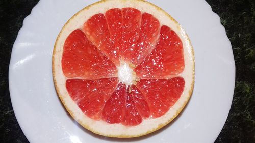 High angle view of strawberry in plate on table