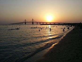 Scenic view of sea at sunset