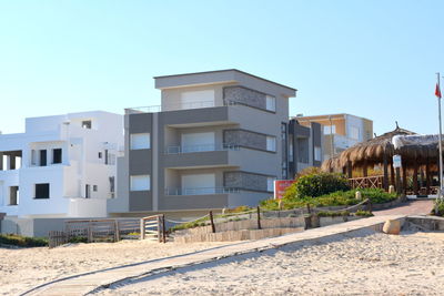 Residential buildings against clear sky