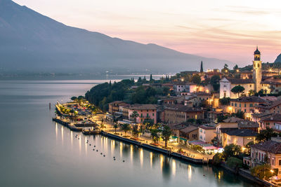 Italian village after sunset at blue hour on garda lake, garda see, limone, brescia, italy