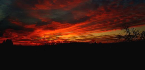 Scenic view of dramatic sky during sunset