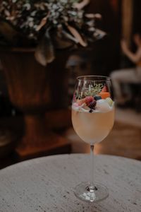 Close-up of wine glass on table