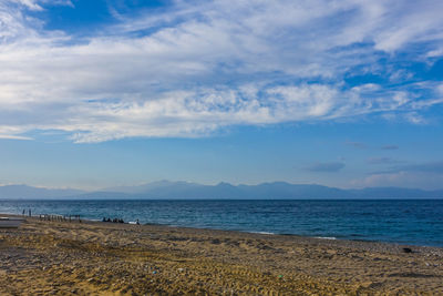 Scenic view of sea against blue sky