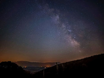 Low angle view of star field against sky at night