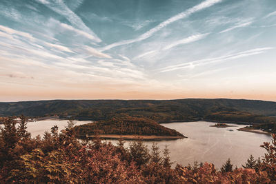 Scenic view of lake against sky during sunset