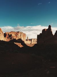 Scenic view of landscape against blue sky