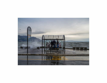 People on beach against sky