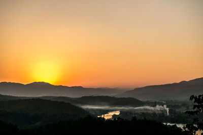 Scenic view of mountains during sunset