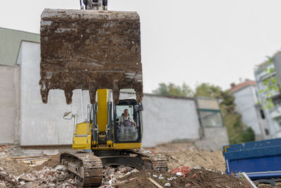 Demolition of old building dismantling. destruction of dilapidated housing for new development