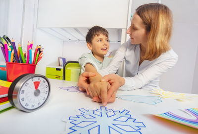 Mother and daughter at clinic