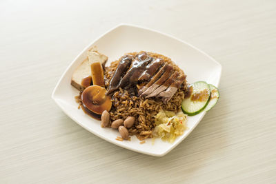 High angle view of food in plate on table