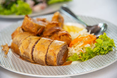Close-up of breakfast served in plate