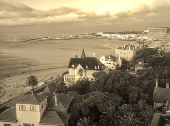 Townscape against cloudy sky