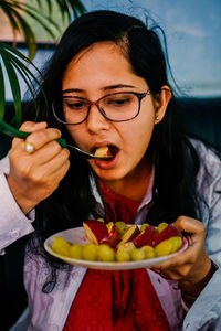 Portrait of smiling young woman having food.women need quality food for diet.