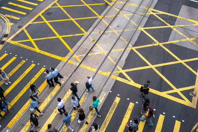 High angle view of people walking on street